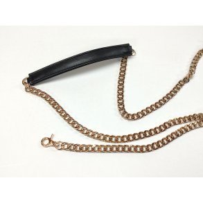 Kde i guld med skulderpude i samme farve som din taske