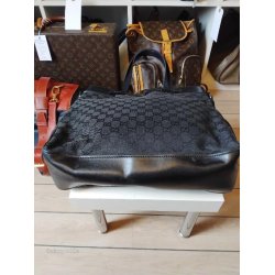 Velholdt Gucci Vintage taske i sort kalveskind og logo stof.