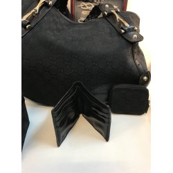 Renoveret gucci Taske i sort stof med skind bestning og 3 etuier medflgende
