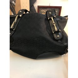 Renoveret gucci Taske i sort stof med skind bestning og 3 etuier medflgende