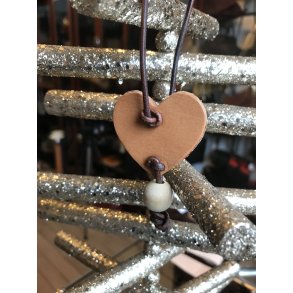 Lderhjerte med kugle i ldersnor