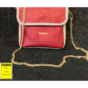 Henriette skindtaske i lkkert bldt okseskind med skindfoer. Eget design.