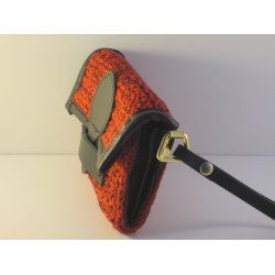 Hklet Clutch med skindbestning.